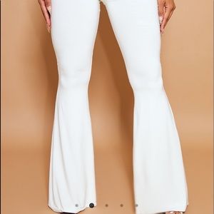 Prettylittlething white flare leggings size 4